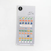 Suatelier Deco.08 savings and money mini sticker sheet with rows of piggy banks, wallets, cash bills, coins, stock charts, and Let's Save Money banner, made in South Korea