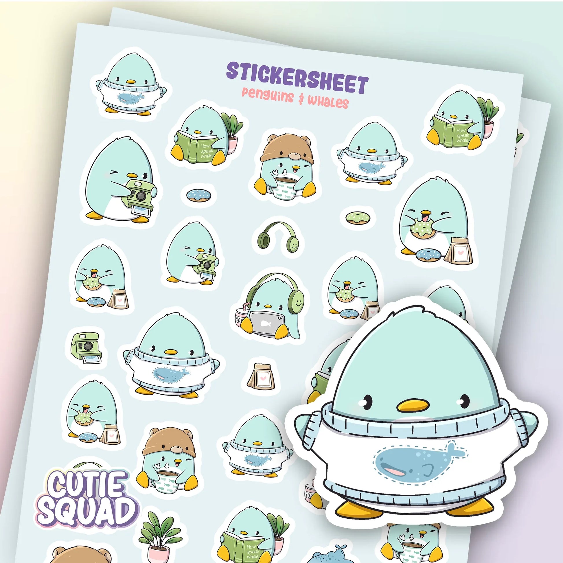 CutieSquad Penguins and Whales matte vinyl sticker sheet featuring small penguins and whales in ocean scenes