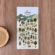 Suatelier Forest woodland scene sticker sheet with illustrated trees, cabins, mountains, rabbits, and flower meadows in green landscape, made in South Korea