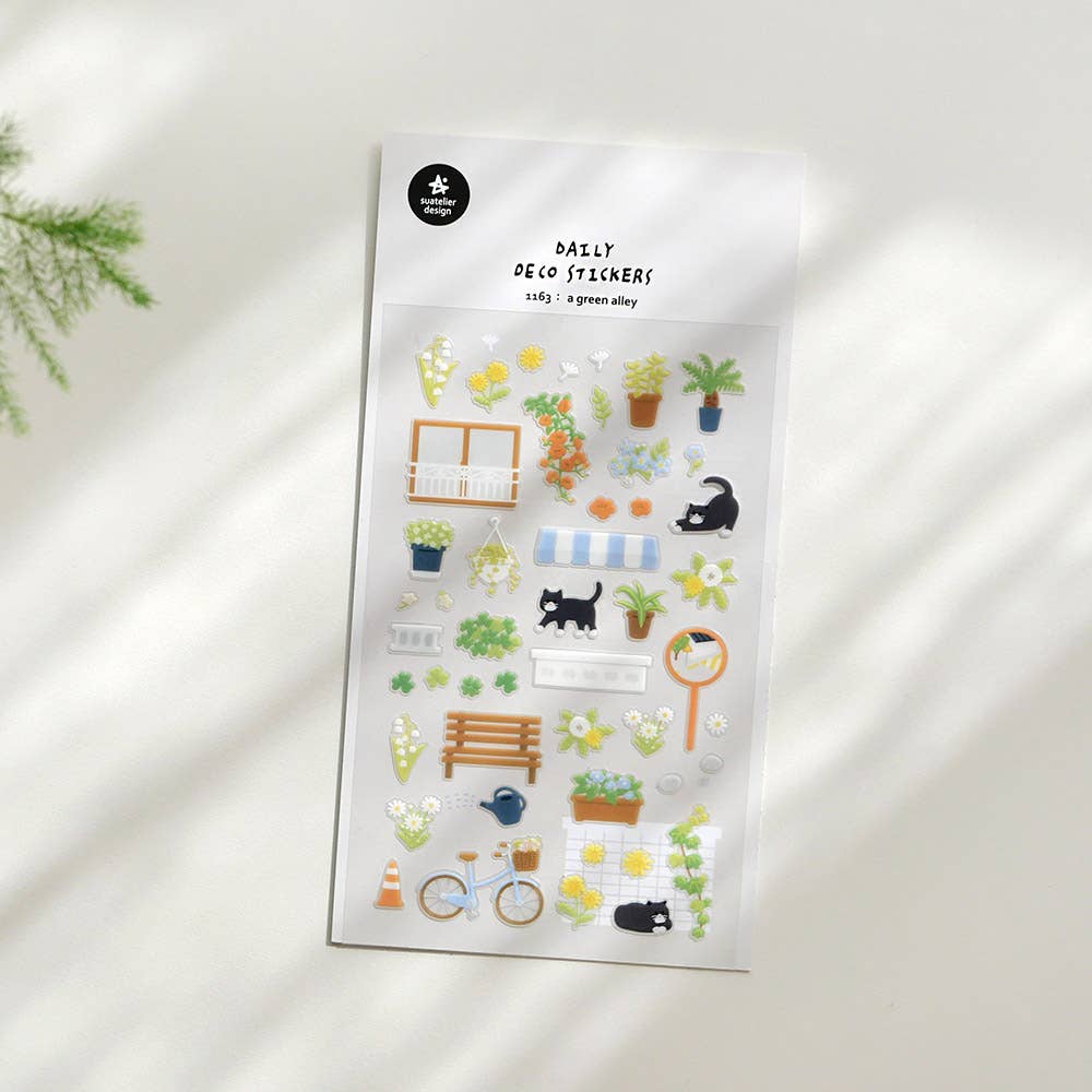Suatelier A Green Alley garden street deco sticker sheet with illustrated flowers, black cats, bicycle, park bench, awning, and garden plants, made in South Korea