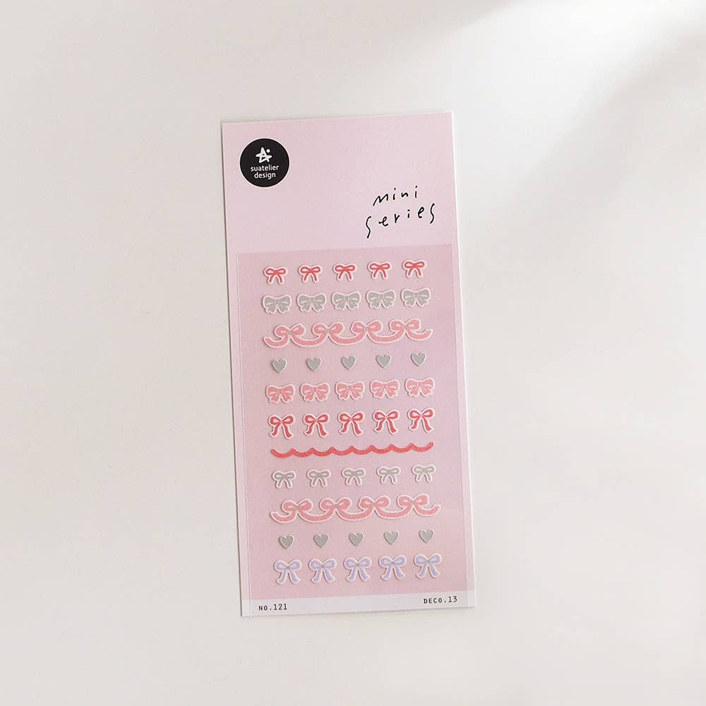 Suatelier Deco.13 pink bows and ribbons mini sticker sheet with rows of tiny bows, hearts, and wavy ribbon lines in pink and rose tones, made in South Korea