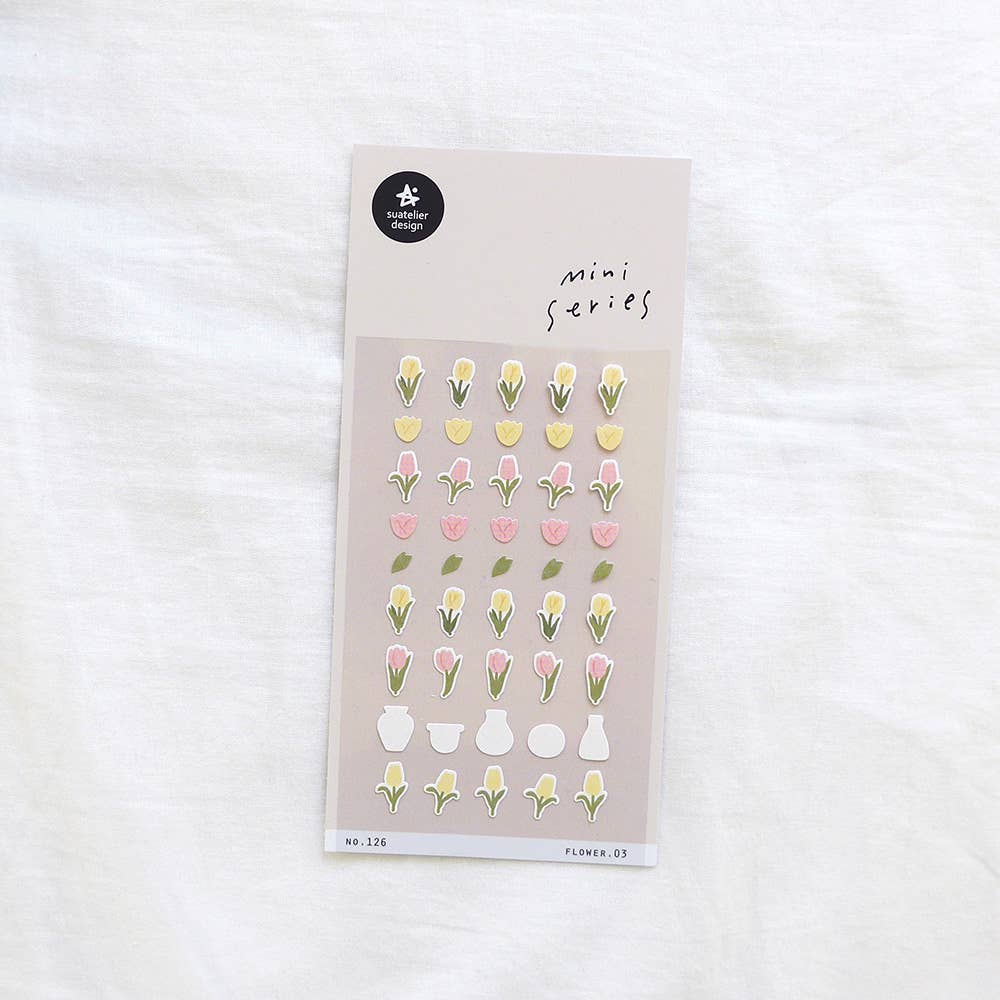 Suatelier Flower.03 tulip mini sticker sheet with rows of yellow and pink tulips, small white vases, and green leaves on soft pink background, made in South Korea