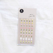 Suatelier Flower.03 tulip mini sticker sheet with rows of yellow and pink tulips, small white vases, and green leaves on soft pink background, made in South Korea