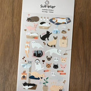 Suatelier Meow cat breed sticker sheet with illustrated tabby, siamese, calico, black, white, and sphynx cats in various poses with toys and accessories, made in South Korea