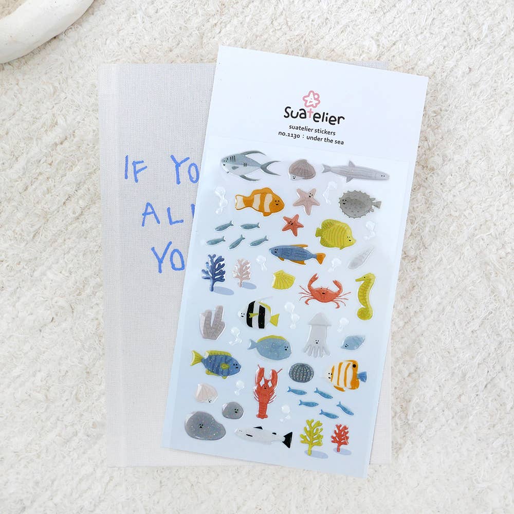 Suatelier Under the Sea epoxy marine life sticker sheet with raised glossy clownfish, sharks, crab, lobster, seahorse, jellyfish, squid, and coral, made in South Korea