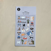 Suatelier Cats Have Staff deco sticker sheet with illustrated cats climbing on furniture, sitting on humans, and bossing around their owners on grey background, made in South Korea
