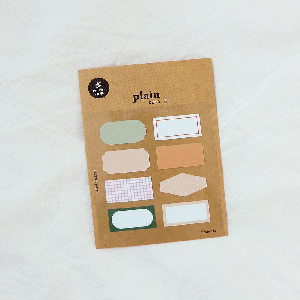 Suatelier Plain.59 earth tone label stickers in oval, rectangle, and hexagon shapes in sage green, peach, cream, and pink grid on kraft paper backing, 2 sheets, made in South Korea