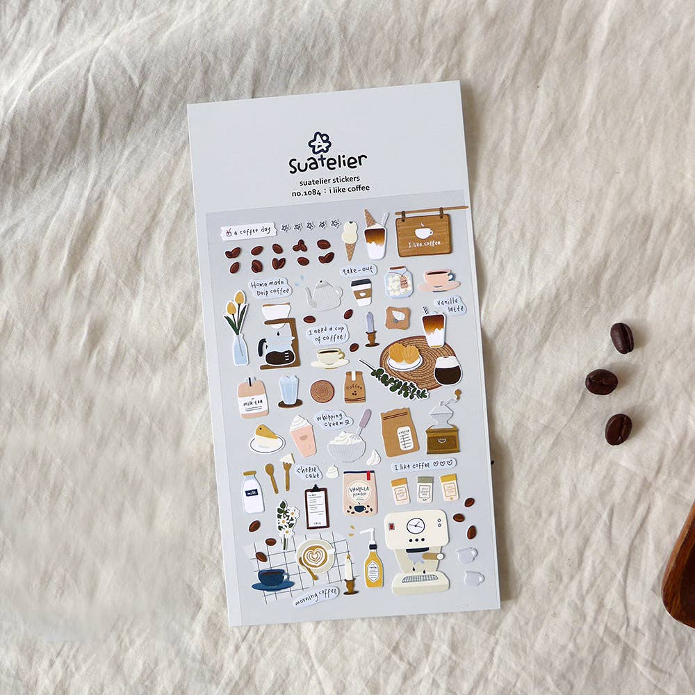 Suatelier I Like Coffee cafe deco sticker sheet with illustrated coffee drinks, espresso machine, beans, croissant, and latte art, made in South Korea