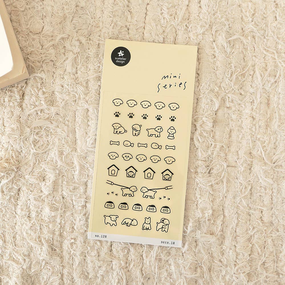 Suatelier Deco.18 puppy icon mini sticker sheet with rows of cute dog faces, paw prints, bones, dog houses, and dogs on leashes on yellow background, made in South Korea