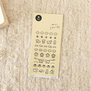 Suatelier Deco.18 puppy icon mini sticker sheet with rows of cute dog faces, paw prints, bones, dog houses, and dogs on leashes on yellow background, made in South Korea