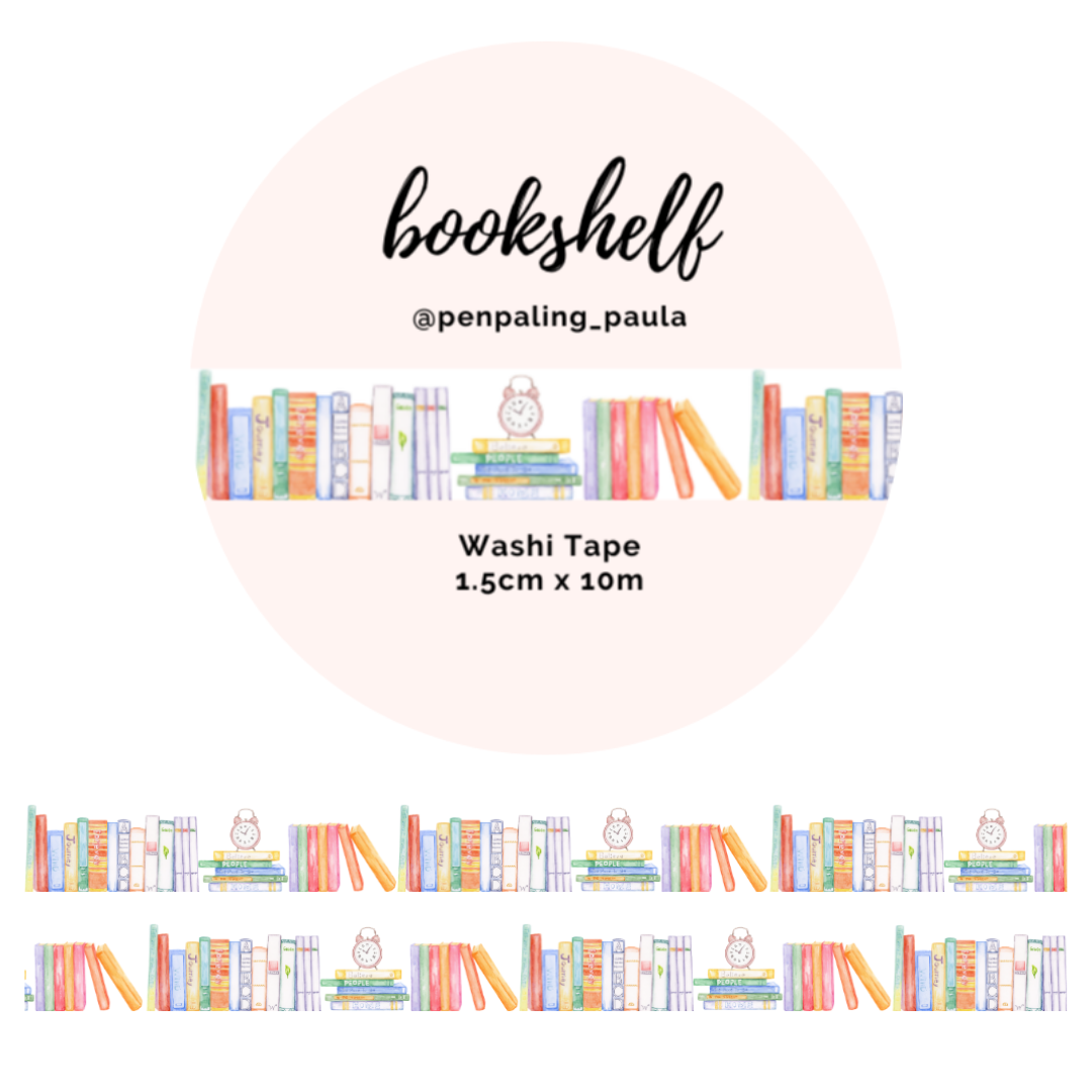Watercolor pastel bookshelf pattern washi tape with standing books and alarm clocks. 1.5cm wide reading themed masking tape by @penpaling_paula for book journals