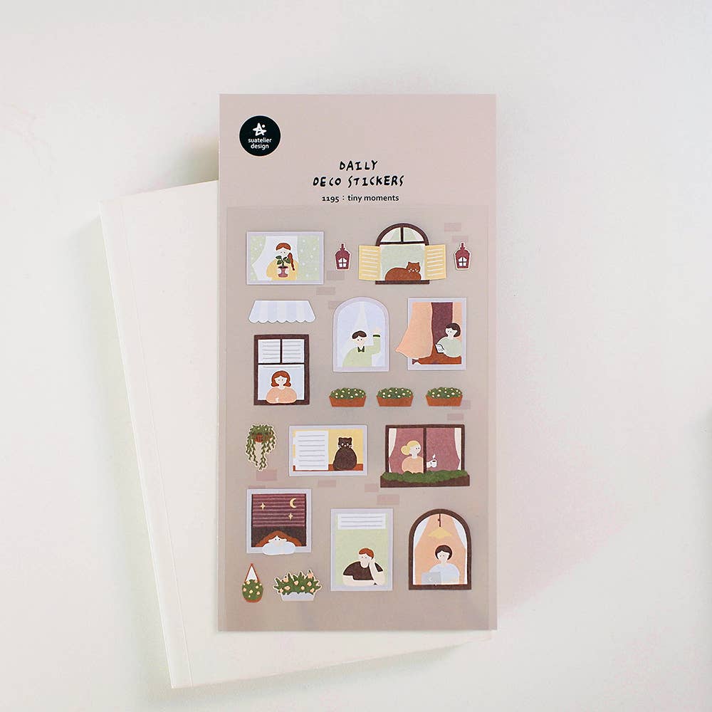 Suatelier Tiny Moments window scene deco sticker sheet with illustrated apartment windows showing people reading, cats, and plants on mauve background, made in South Korea